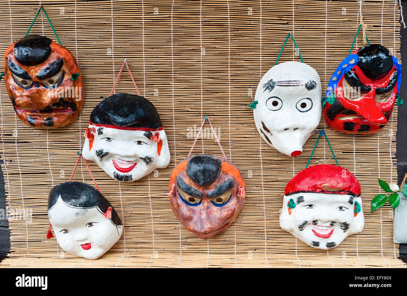 Grotesque masks for children outside a toyshop in Japan Stock Photo