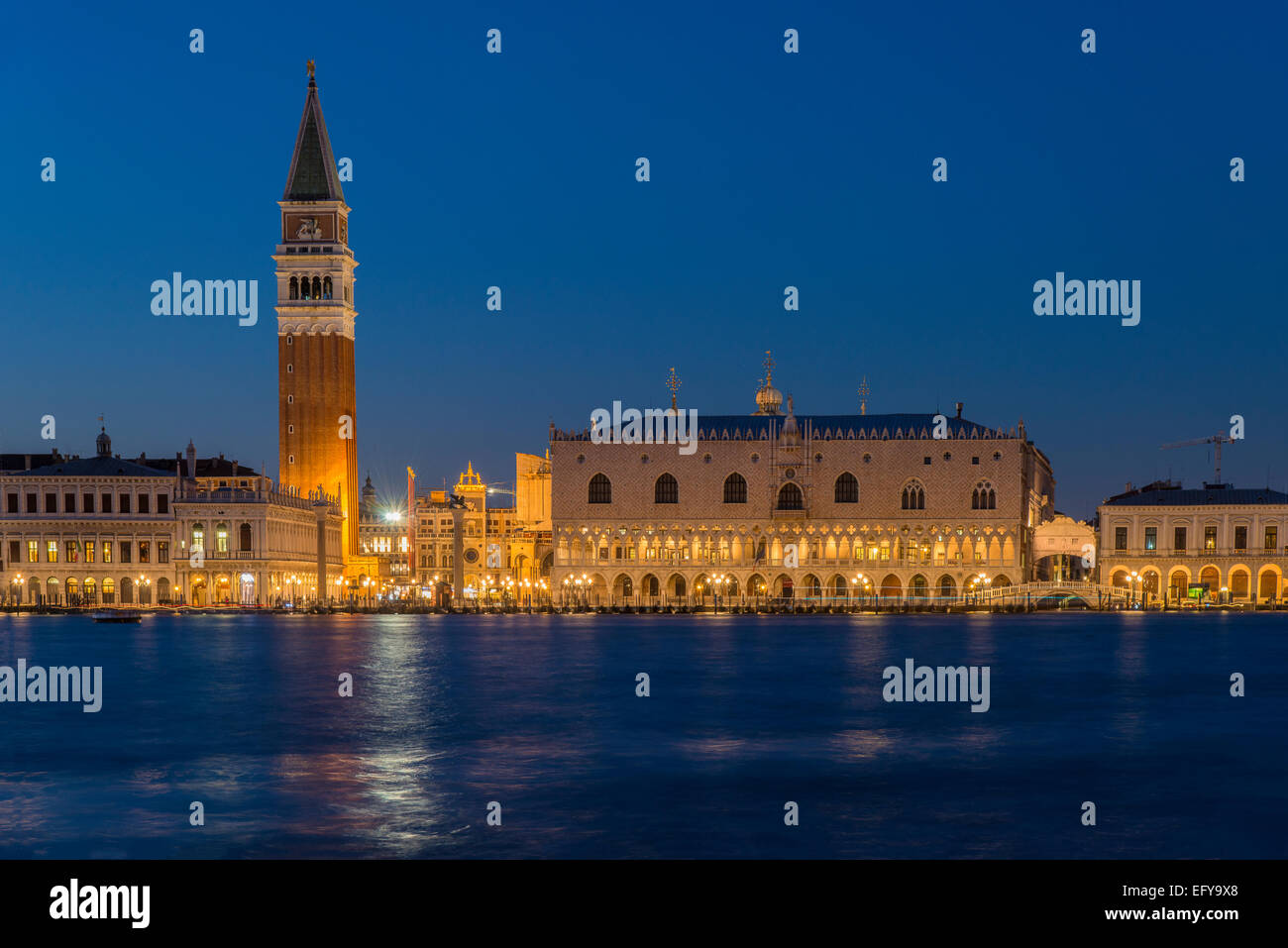 Night view of St Mark’s Campanile and Doge’s Palace, Venice, Veneto, Italy Stock Photo