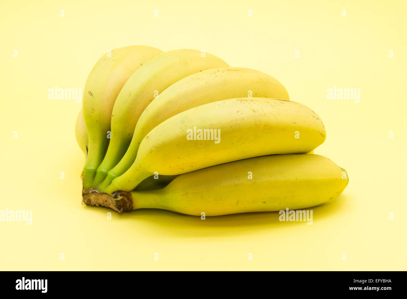 bananas on a yellow background Stock Photo