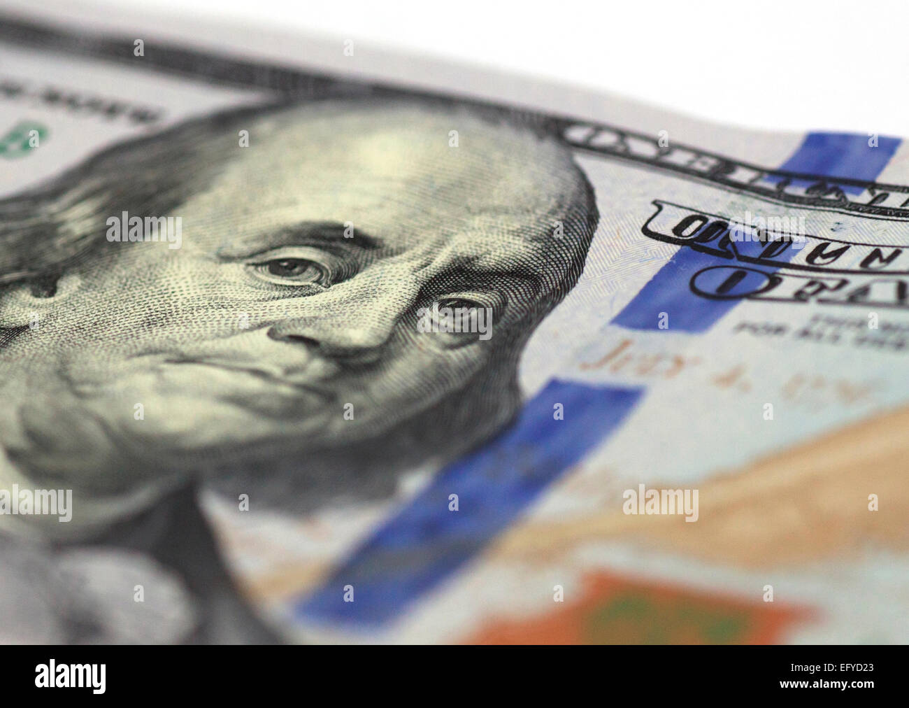 close up of Benjamin Franklin stare on one hundred dollars banknote Stock Photo