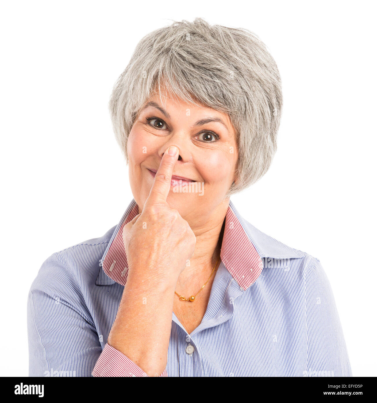 Portrait of a elderly woman making a funny face Stock Photo