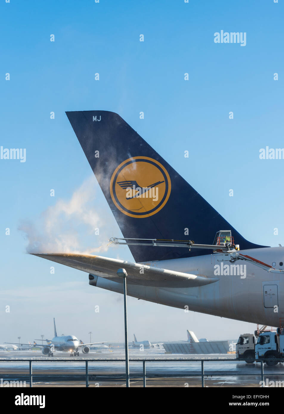 Tail fin of a Lufthansa Airbus A380-841 during deicing at Frankfurt Airport, Frankfurt am Main, Hesse, Germany Stock Photo