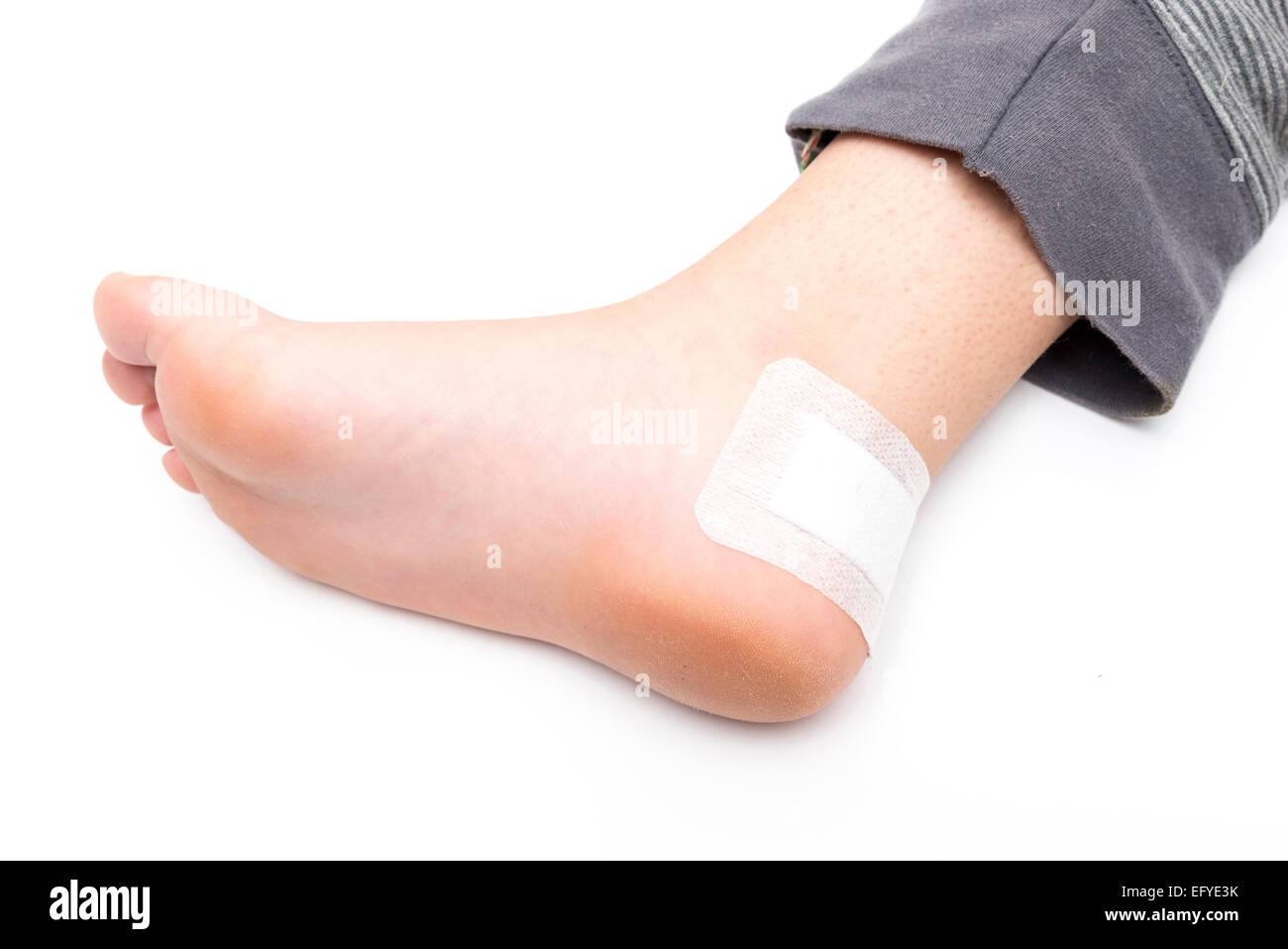 standing with a healed wound on a white background Stock Photo