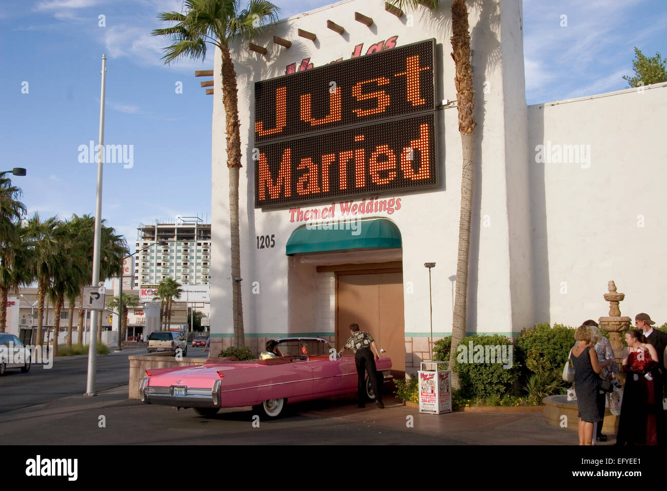Elvis delivers the bride in a pink Cadillac at Viva Las Vegas chapel in Las Vegas, Nevada Stock Photo