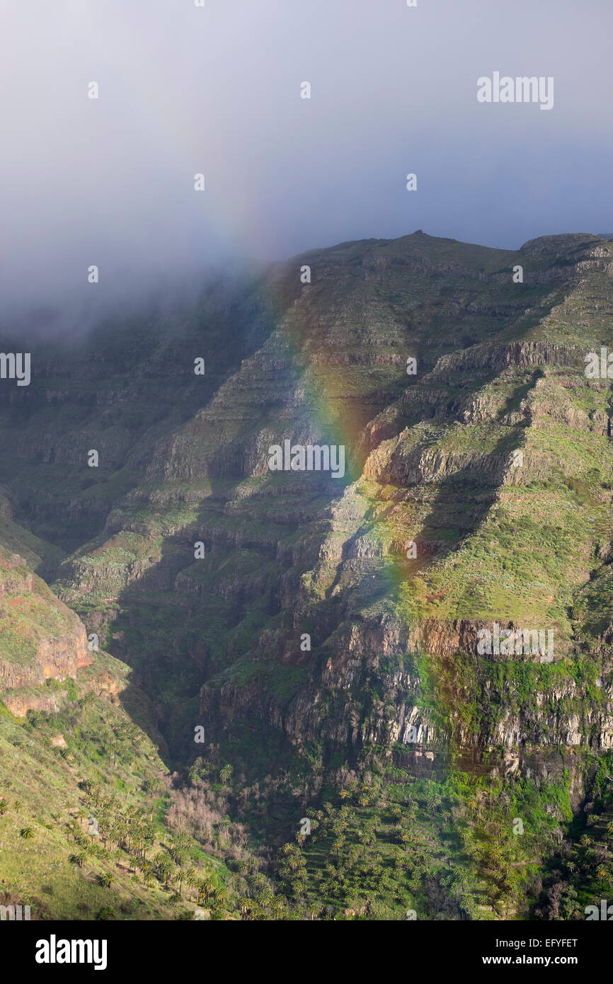 Rainbow, view from Mirador Cesar Manrique, VaRMRMe Gran Rey, RMa Gomera, Canary IsRMands, Spain Stock Photo