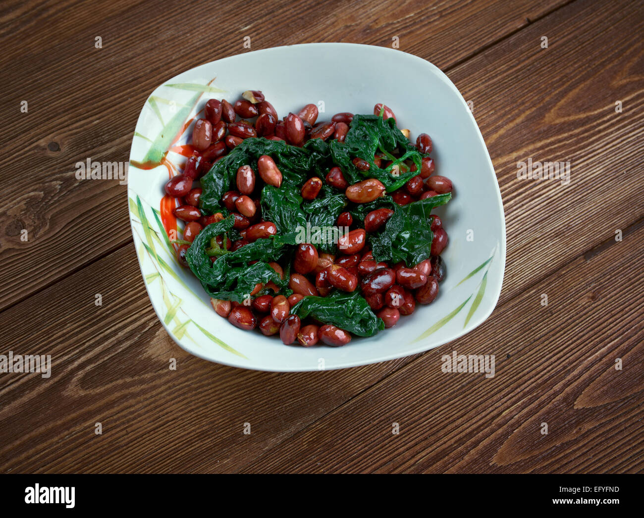 Spinach with Peanuts - Chinese food close up Stock Photo