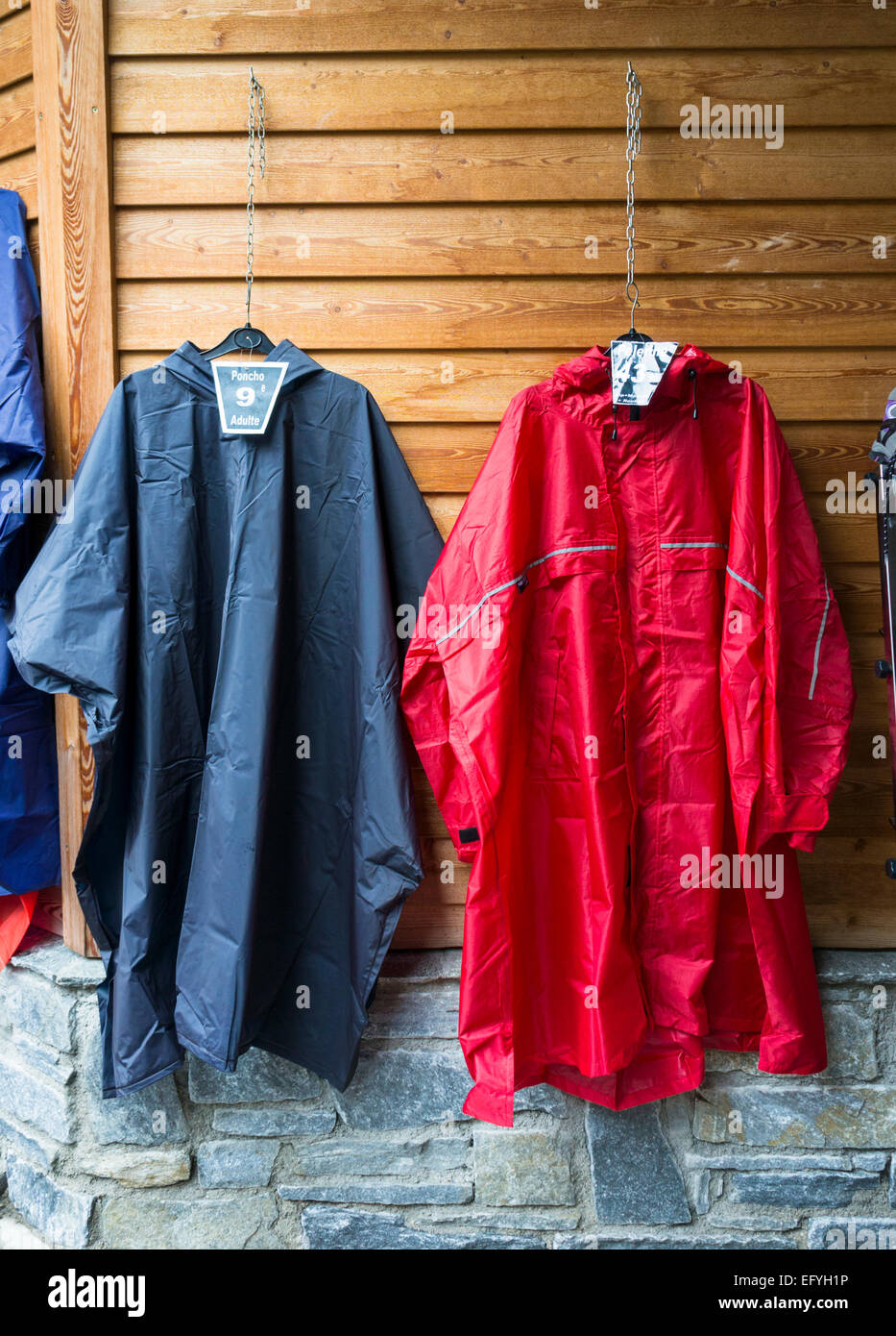 Waterproof cagoules on display outside a climbing shop, Europe Stock Photo