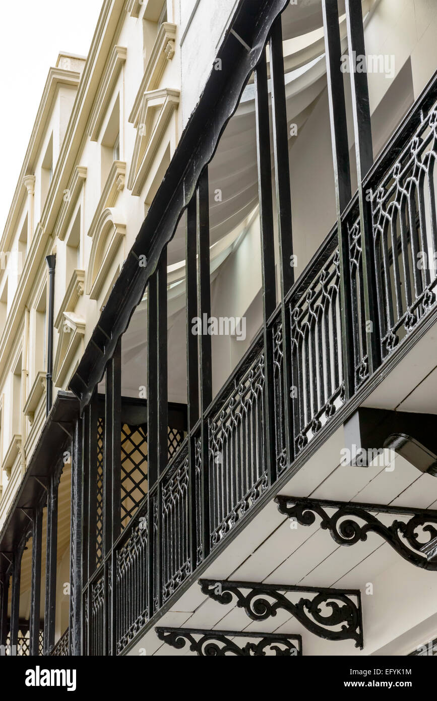 detail of balcony railing made in cast-iron in center of touristic sea