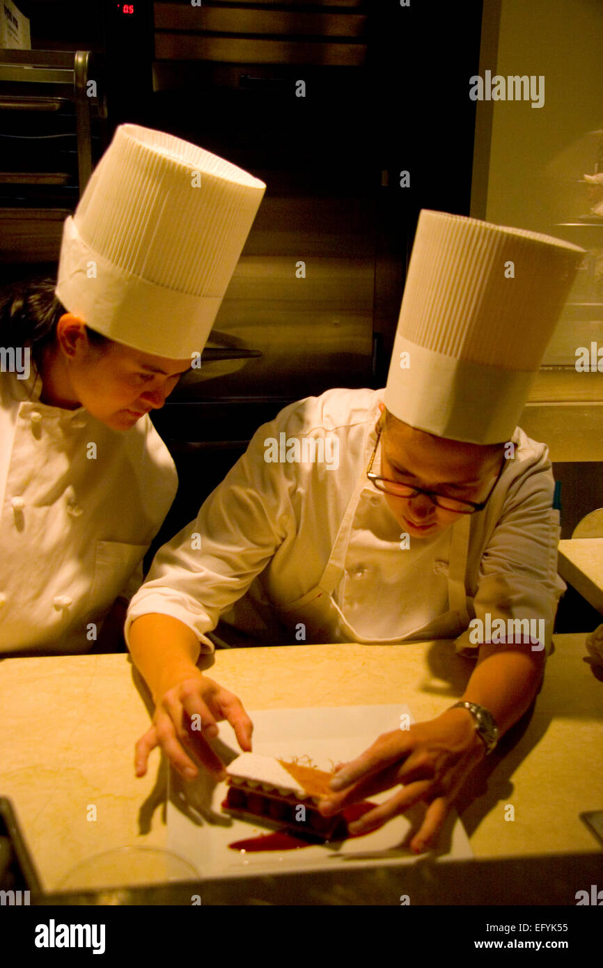 Pastry chefs at Alain Ducasse's Mix restaurant atop the hotel at Mandalay Bay, Las Vegas, Nevada Stock Photo