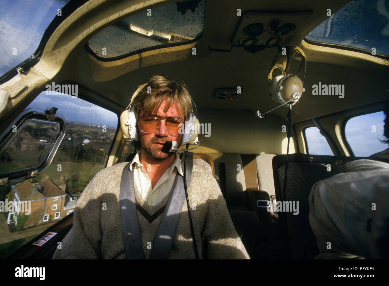 Noel Edmonds flying his Helicopter photographed for Decanter Magazine in 1986. Well known DJ 