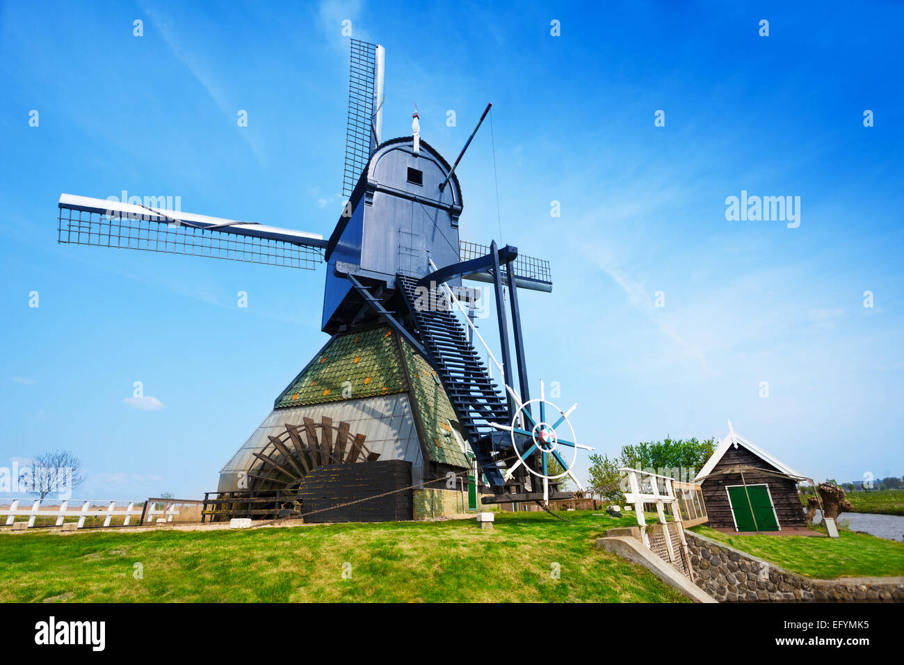 Old rotating water pumping windmill in Holland Stock Photo Alamy