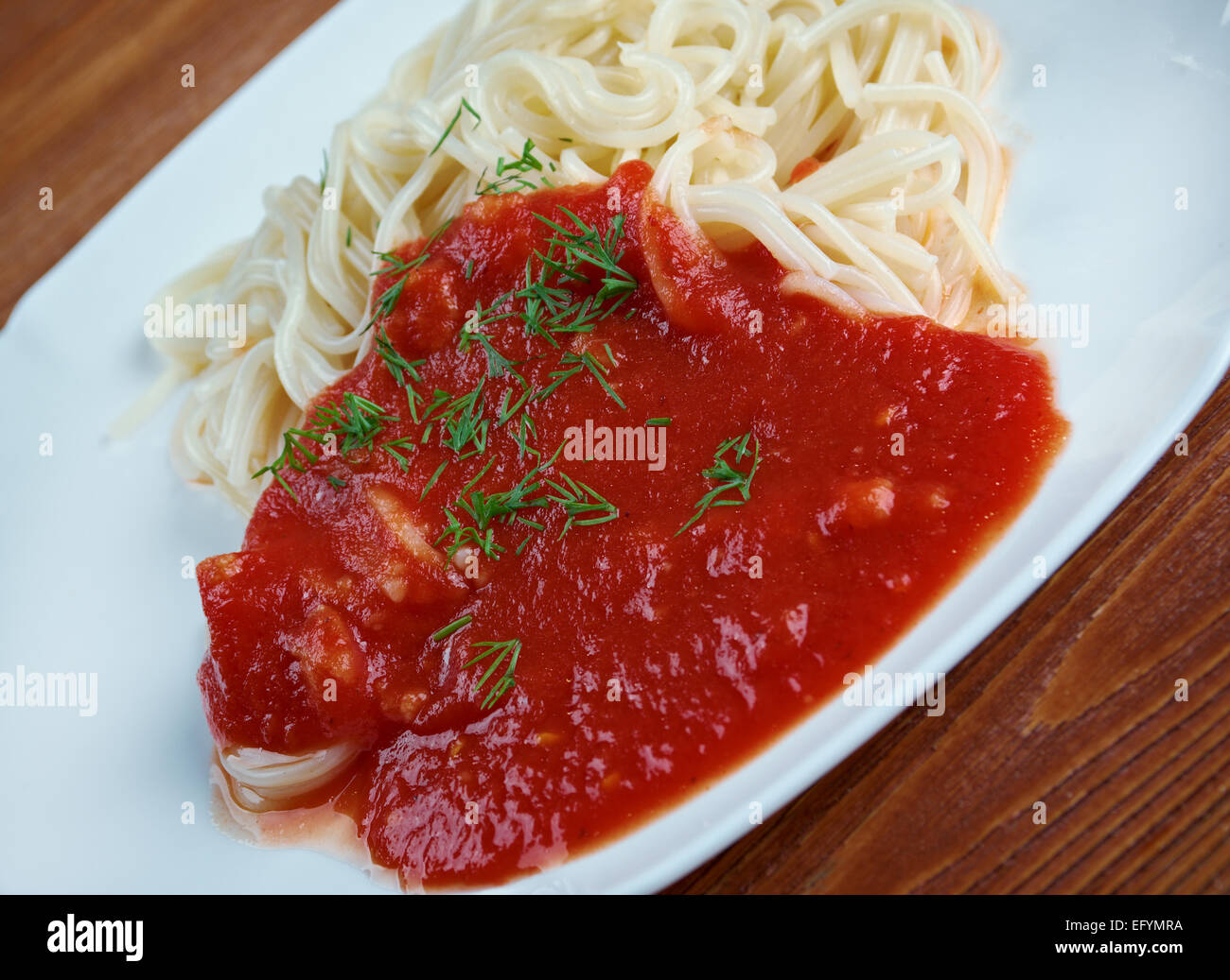 vermicelli homemade pasta with tomato sauce Stock Photo Alamy