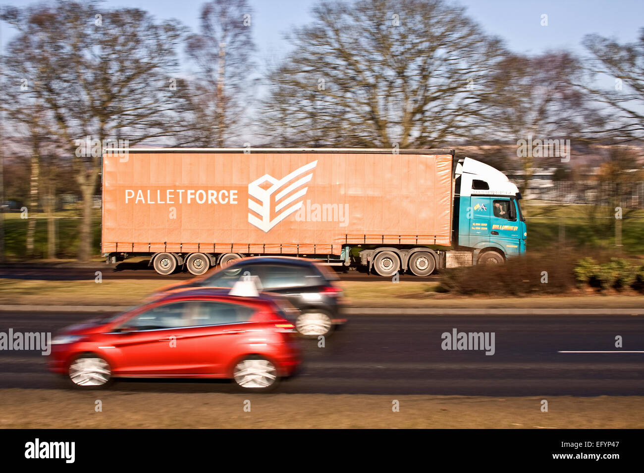 Palletforce articulated lorry travelling along the Kingsway Dual Carriageway in Dundee, UK Stock Photo