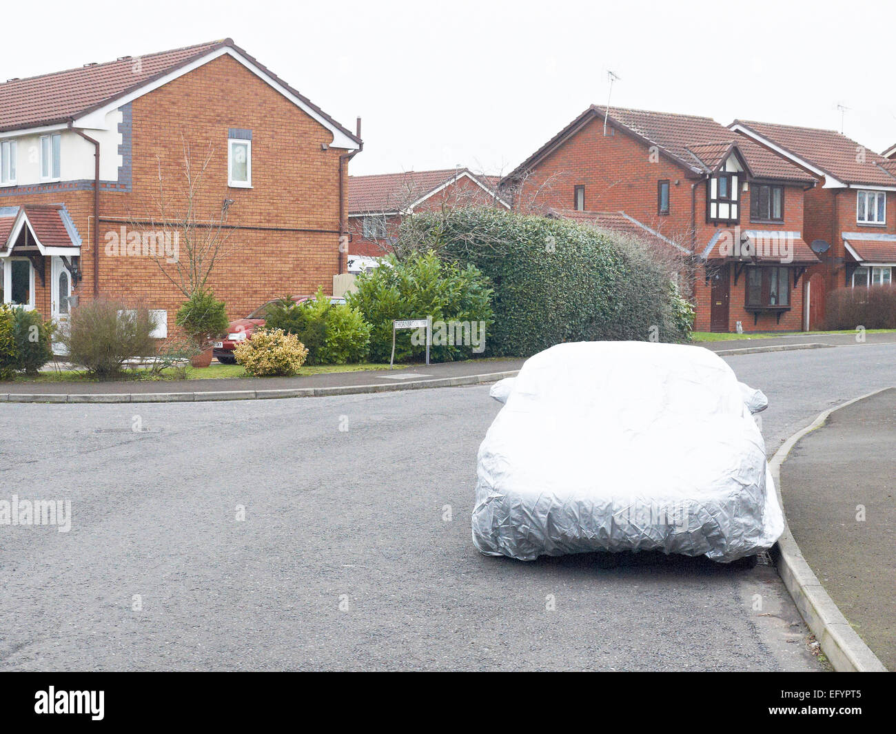 Porsche 911 car under a car cover parked on a road in Notting Hill, London,  UK Stock Photo - Alamy