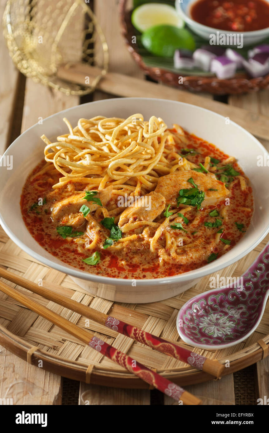 Khao soi. Coconut and curry flavored noodles. Northern Thailand Stock Photo