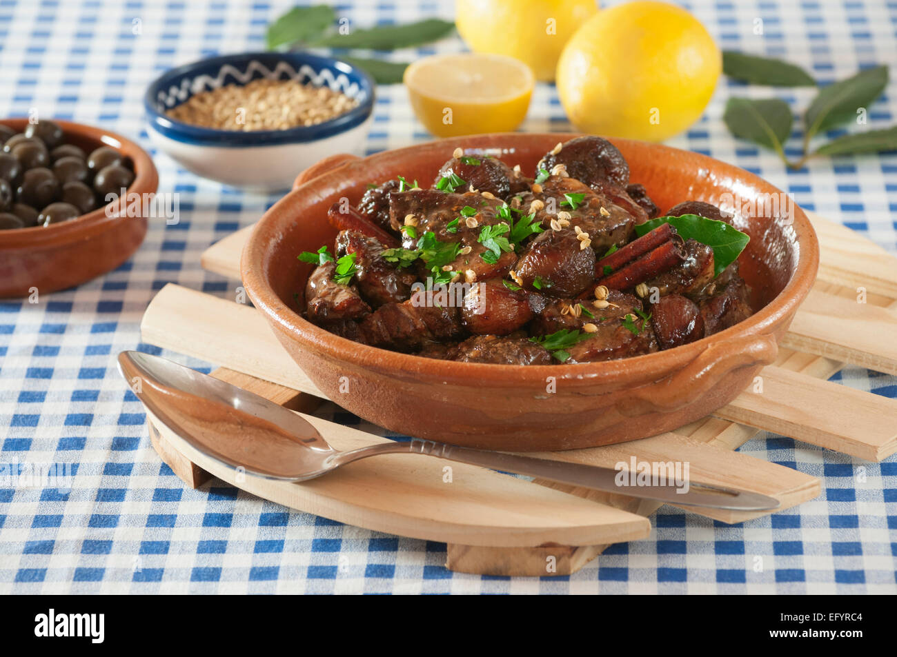 Afelia. Pork with red wine and coriander seed. Stock Photo