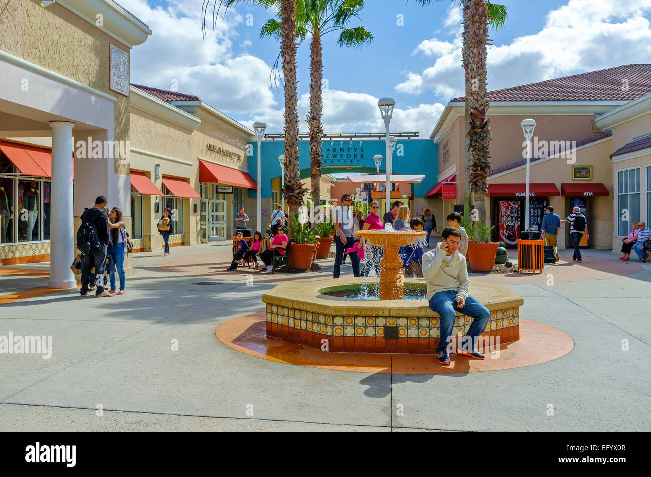 Shoppers outside at the Orlando International Premium Outlets shopping Mall, International Drive, Orlando, Florida, America Stock Photo