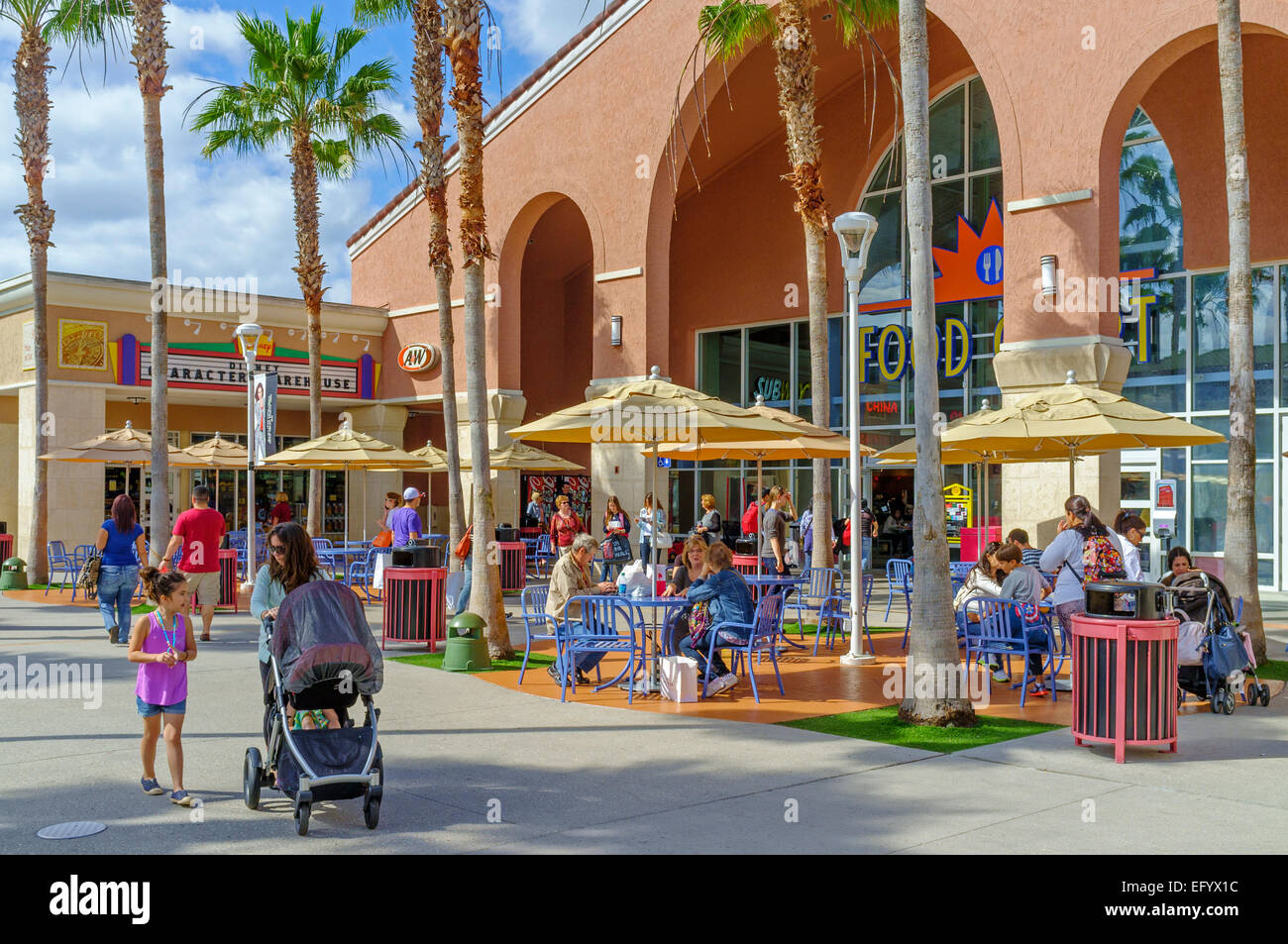 Shoppers outside at the Orlando International Premium Outlets