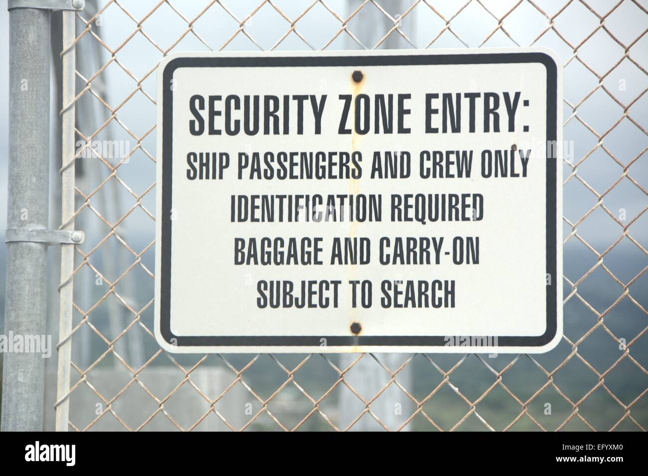 Security warning sign at port Stock Photo