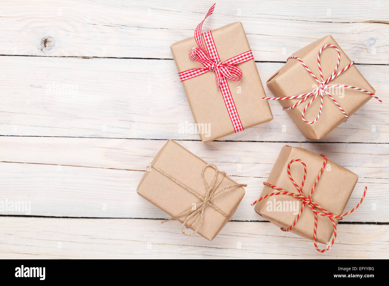 Gift boxes on wooden table background with copy space Stock Photo - Alamy