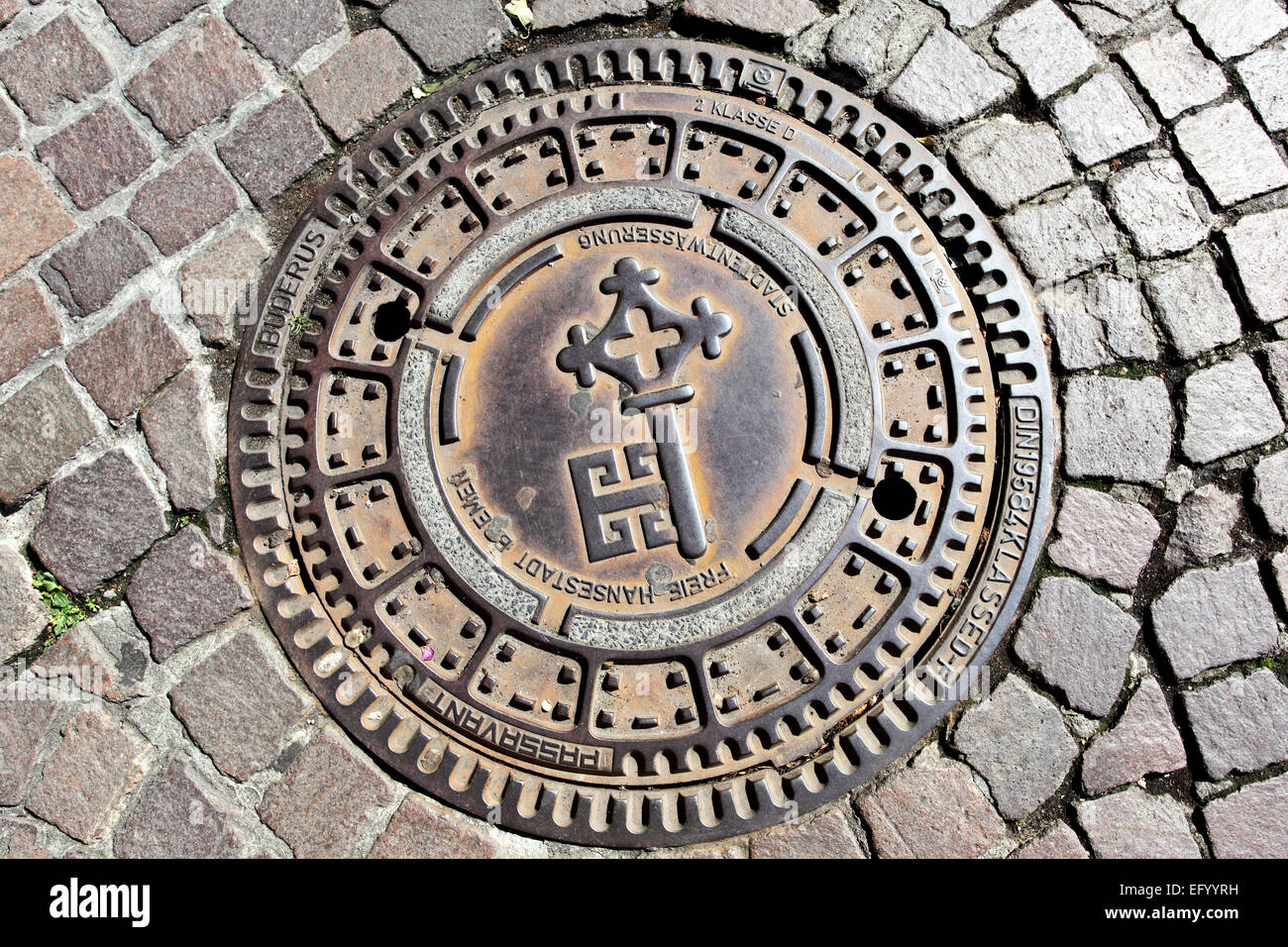 Man hole cover in Bremen, Germany Stock Photo