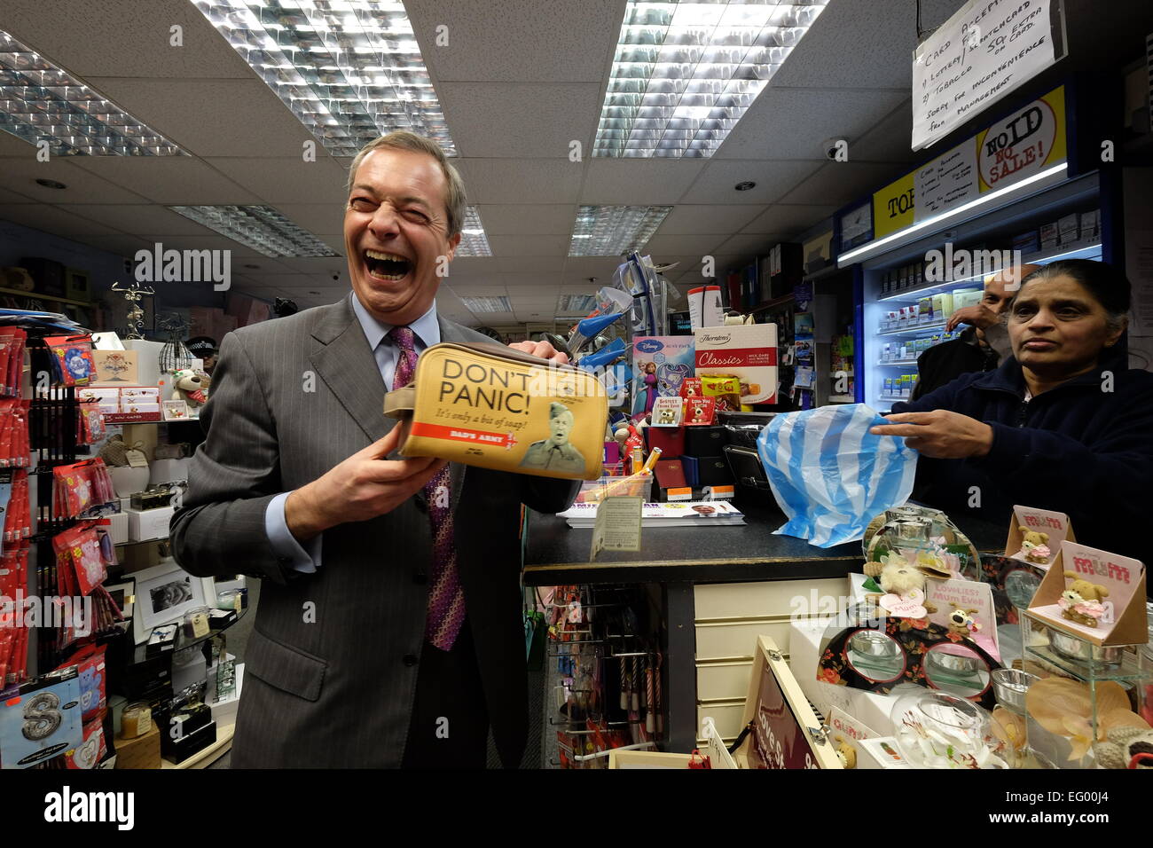 Canvey Island, Essex, UK. 12th Feb, 2015. Farage at a local newsagent Credit:  Rachel Megawhat/Alamy Live News Stock Photo