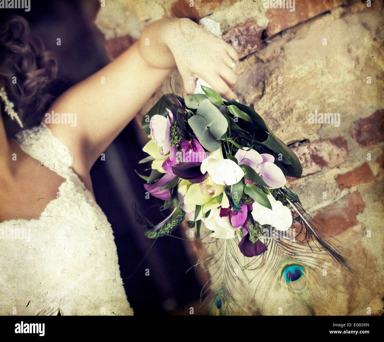 Vintage photo of bride holding wedding bouquet Stock Photo - Alamy