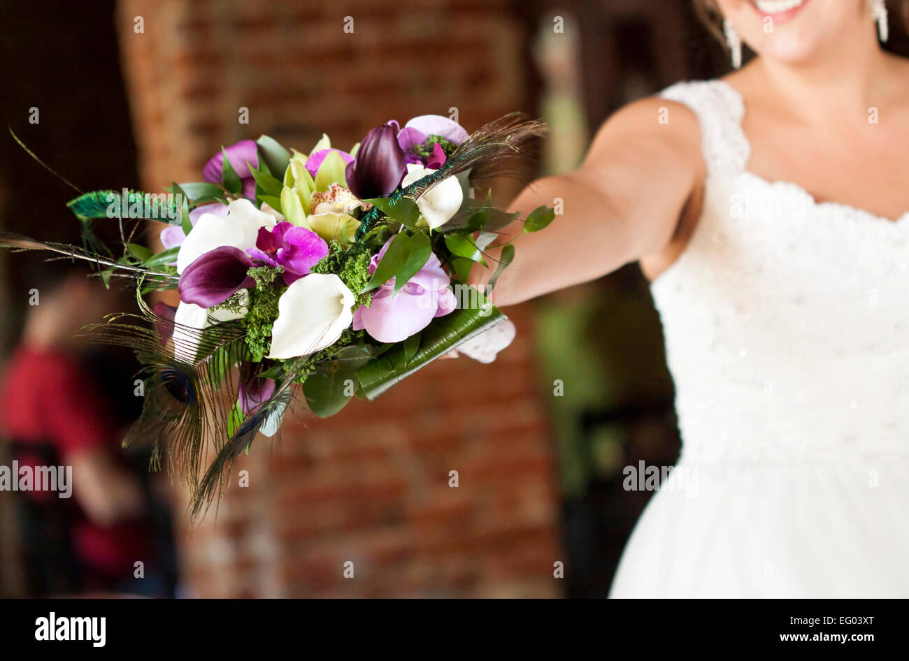 Bride holding wedding bouquet Stock Photo - Alamy