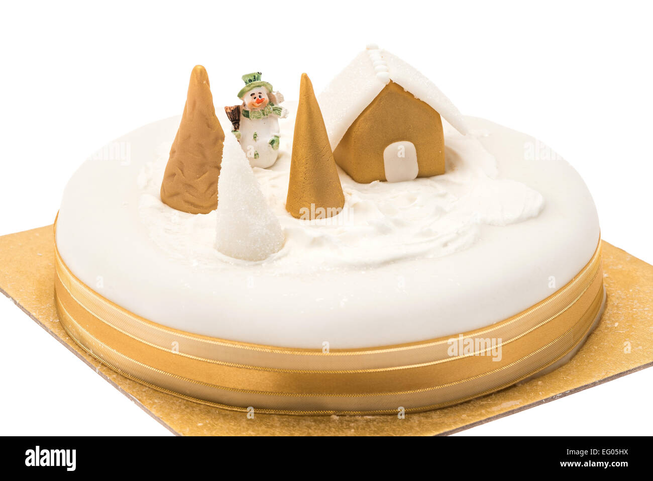 Traditional Christmas cake with white fondant icing - white background Stock Photo