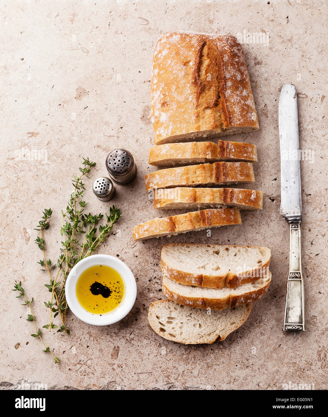 Fresh ciabatta with olive oil and thyme Stock Photo