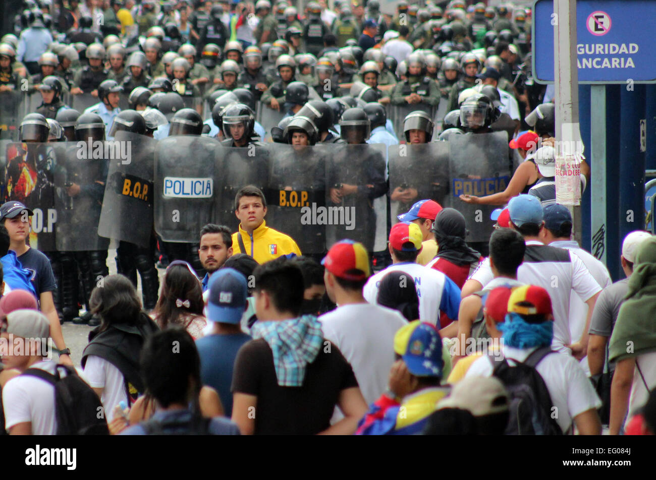 Tachira, Venezuela. 12th Feb, 2015. Demonstrators clash with the police and the National Guard after a march in memory of those killed in 2014 anti-government demonstrations, on the occassion of the Youth Day in Tachira, Venezuela, on Feb. 12, 2015. Credit:  Str/Xinhua/Alamy Live News Stock Photo