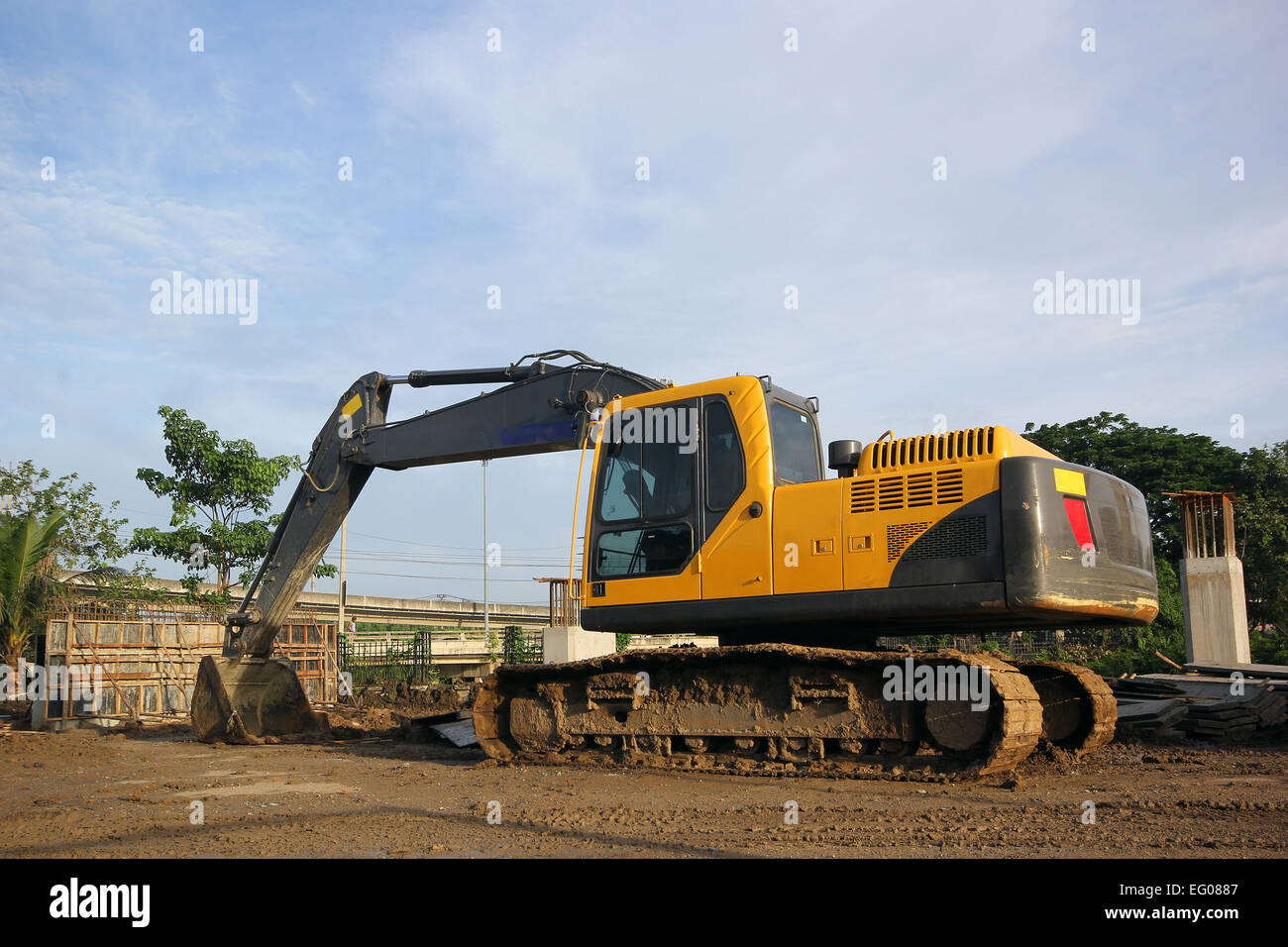 excavator and backhoe on construction site Stock Photo - Alamy