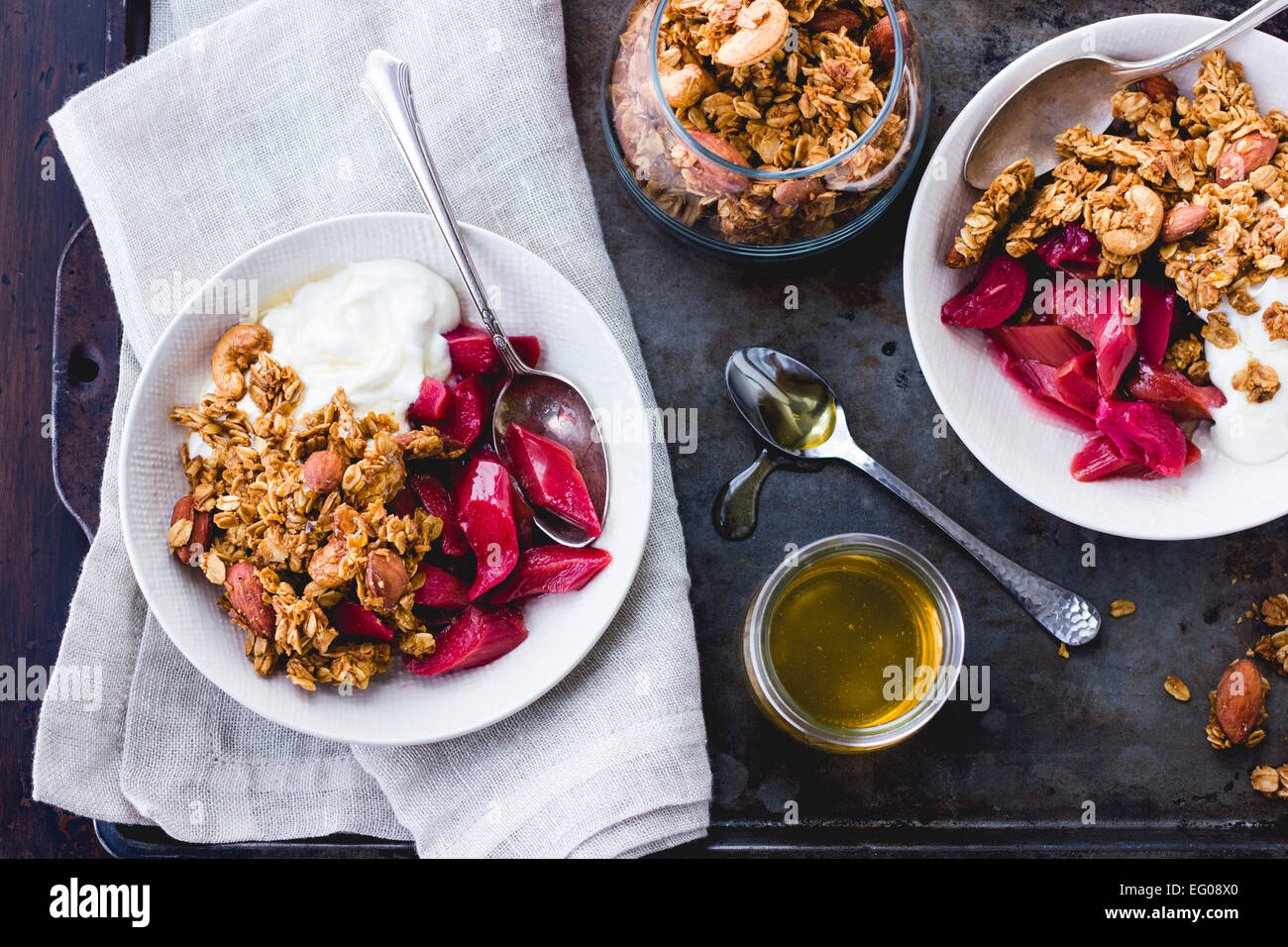 Poached rhubarb and honey, yoghurt and granola breakfast Stock Photo