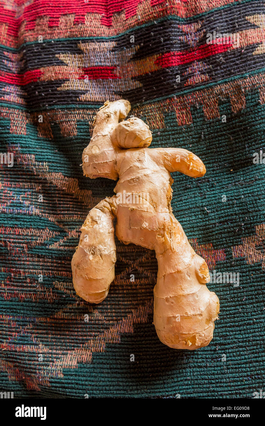 piece of ginger root that looks like a human figure Stock Photo