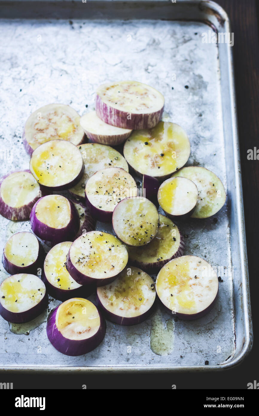 Eggplant, aubergines on a cutting board Stock Photo