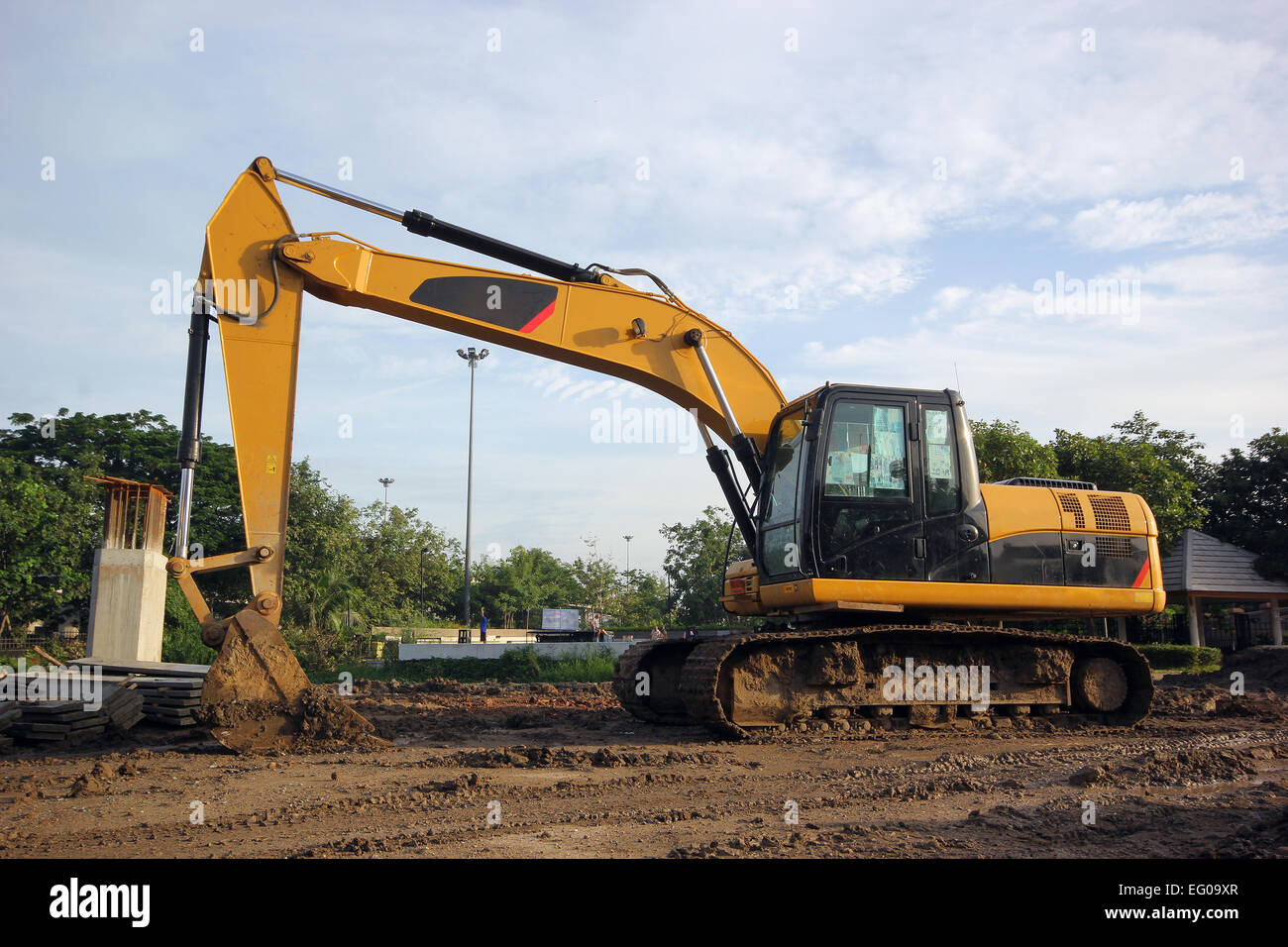 excavator and backhoe on construction site Stock Photo - Alamy