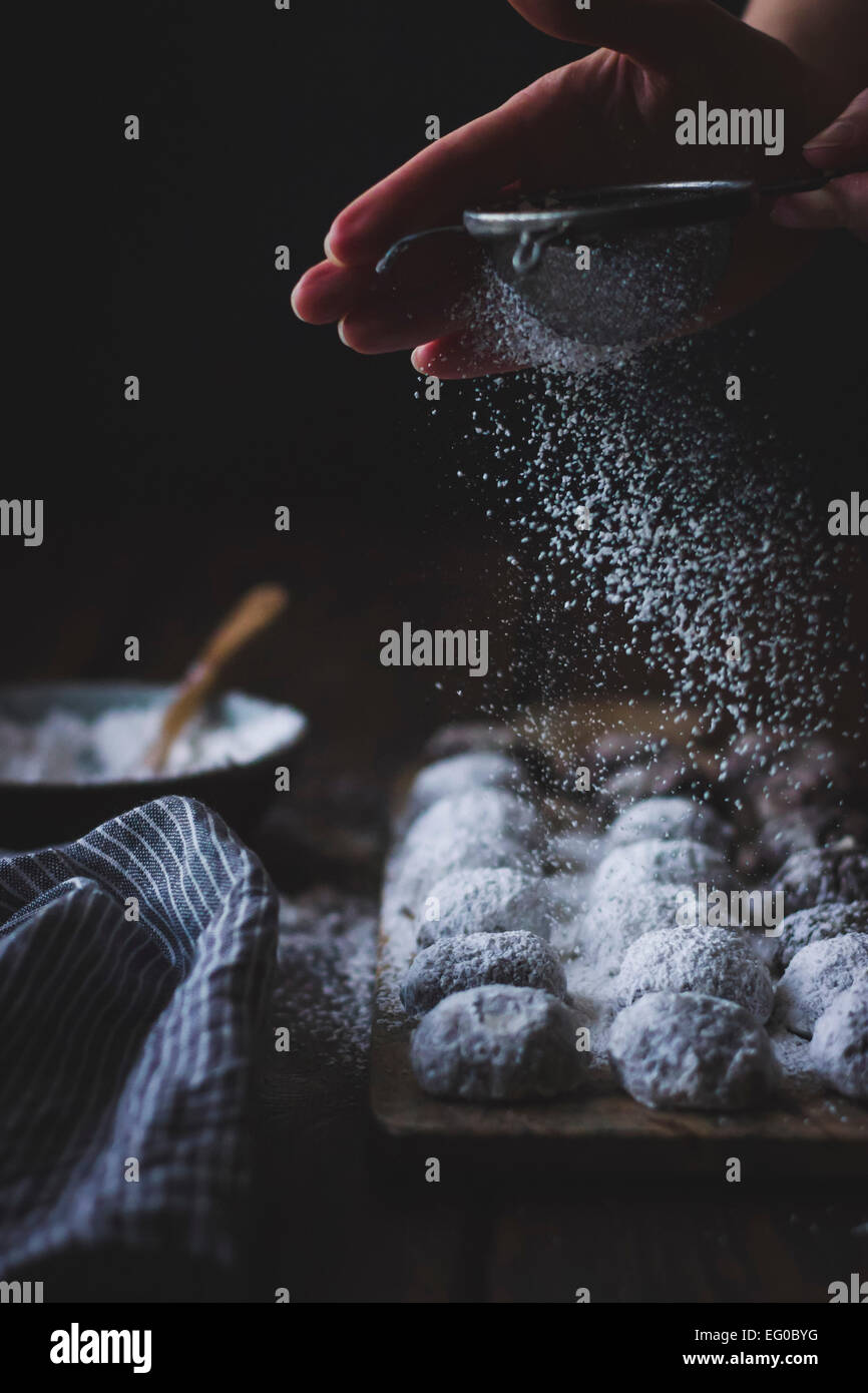 Cocoa polvorones (snowballs) covered in icing sugar Stock Photo