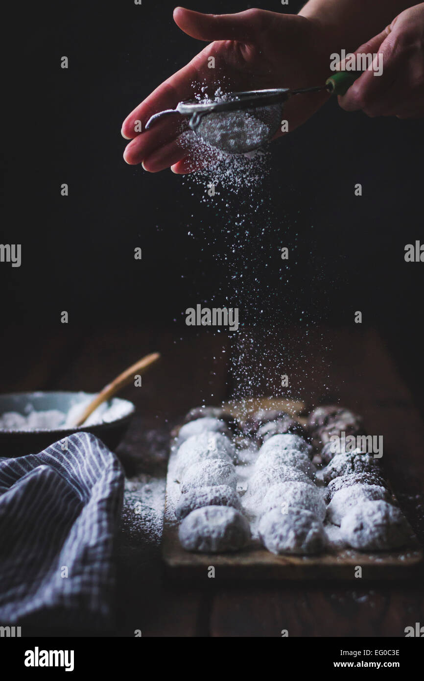 Cocoa polvorones (snowballs) covered in icing sugar Stock Photo