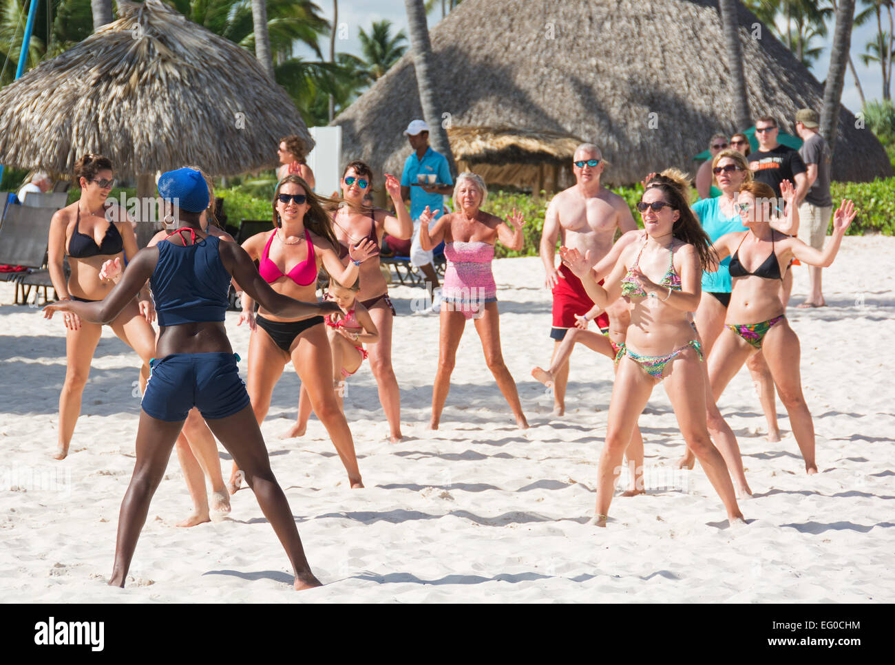 DOMINICAN REPUBLIC. Holidaymakers enjoying a Caribbean dance class at the Now Larimar resort on Punta Cana beach. 2015. Stock Photo