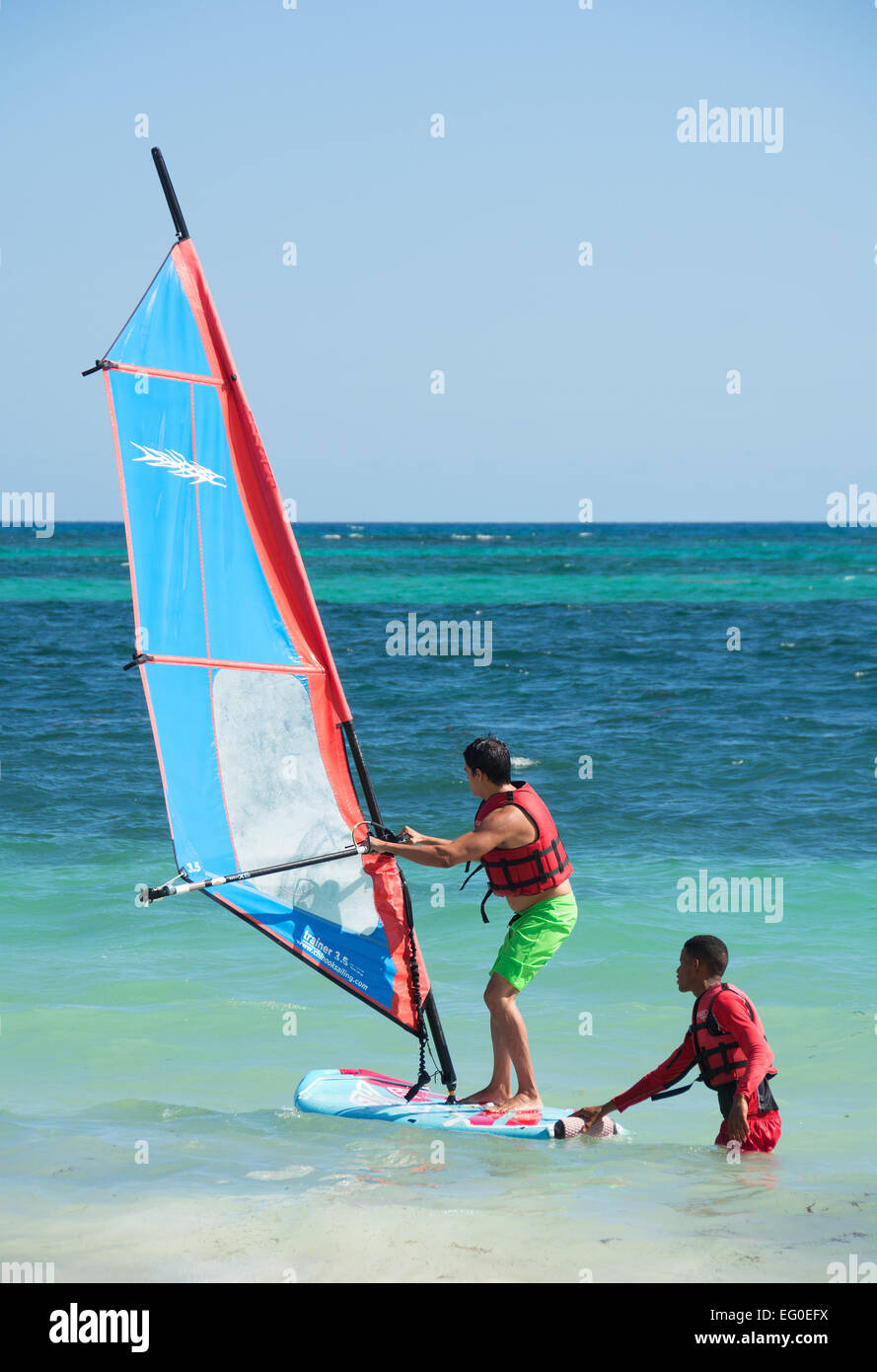 DOMINICAN REPUBLIC. A young man learning to windsurf at Punta Cana