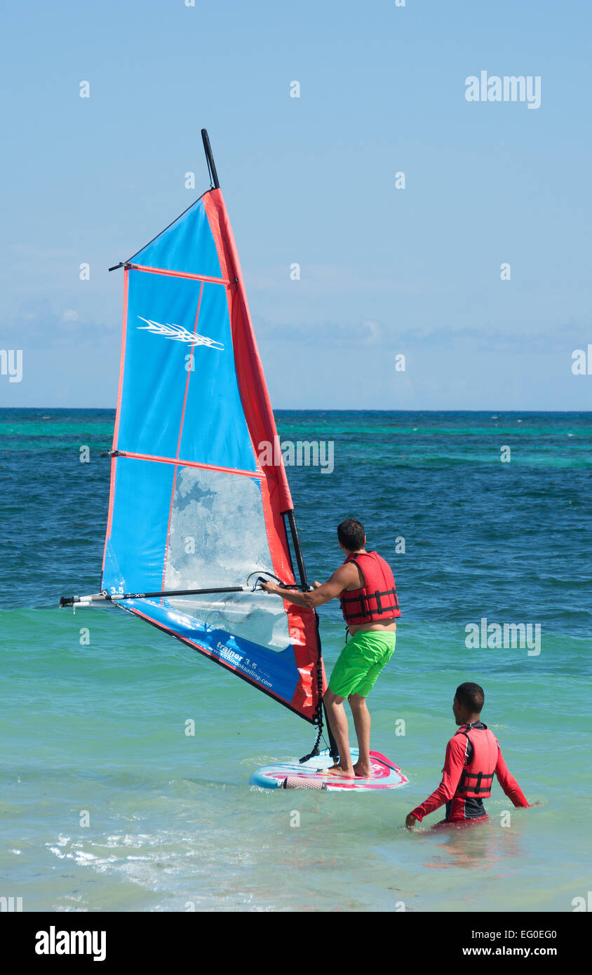 DOMINICAN REPUBLIC. A young man learning to windsurf at Punta Cana