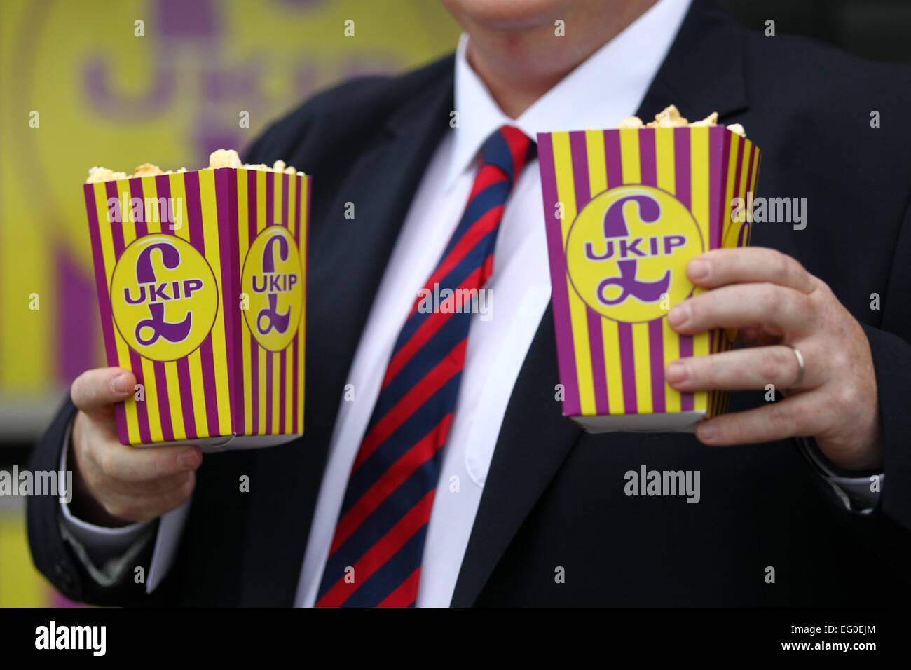 UK Independence Party members holding UKIP branded pop corn outside the Movie Starr Cinema in Canvery Island. Stock Photo