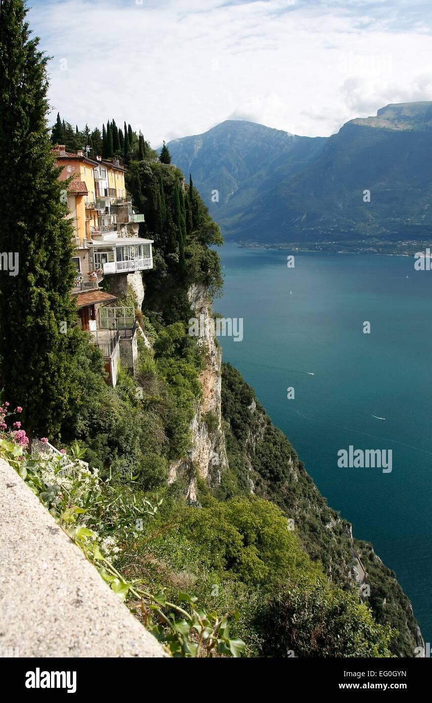 The Paradiso Hotel was built directly on a rock wall. The veranda of the restaurant hanging over the abyss. From there it goes 460 meters down into the depths. But you enjoys a fantastic view over Lake Garda. Photo: Klaus Nowottnick Date: August 28, 2014 Stock Photo