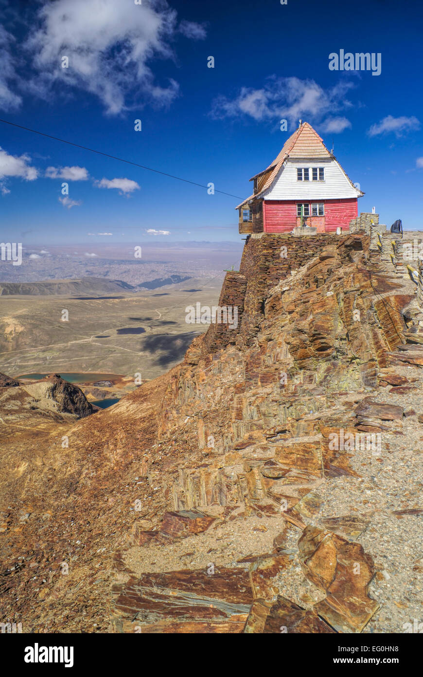 Wooden hut on the edge of cliff on mountain Chacaltaya in south american Andes Stock Photo