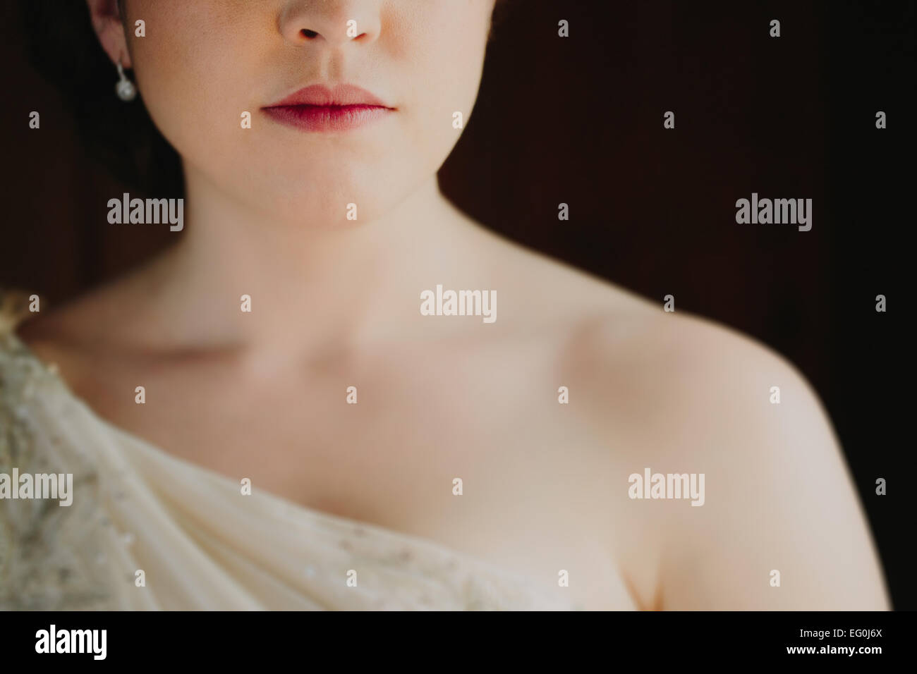 Close up of woman in wedding dress Stock Photo
