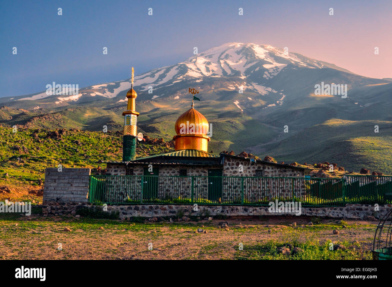 Picturesque mosque underneath volcano Damavand, highest peak in Iran Stock Photo