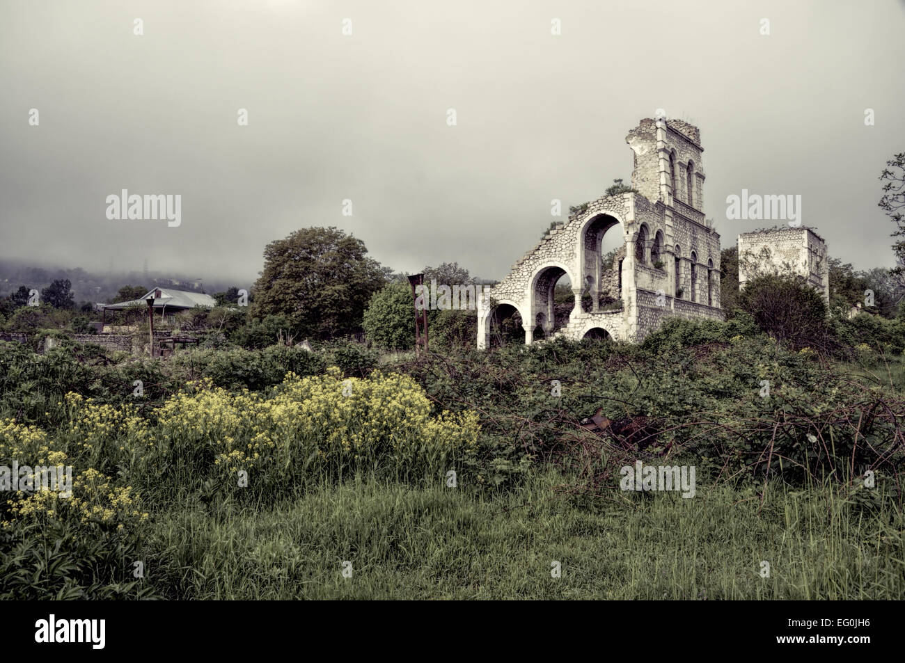 Ruins of old villa in mountainous Karabakh destroyed by war Stock Photo