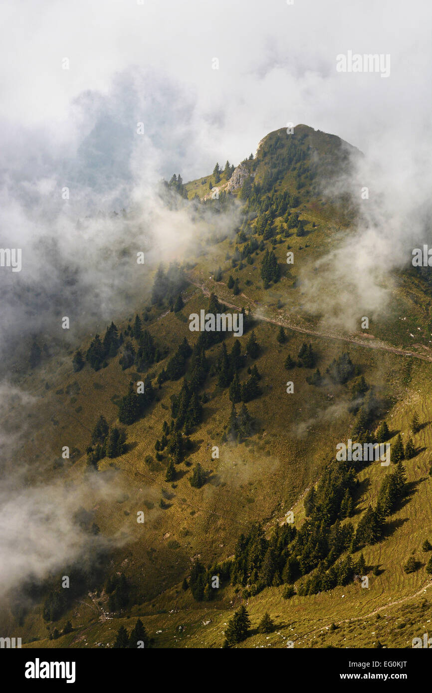 Switzerland, Swiss Alps, Rochers-de-Naye, View of mountain in fog Stock Photo