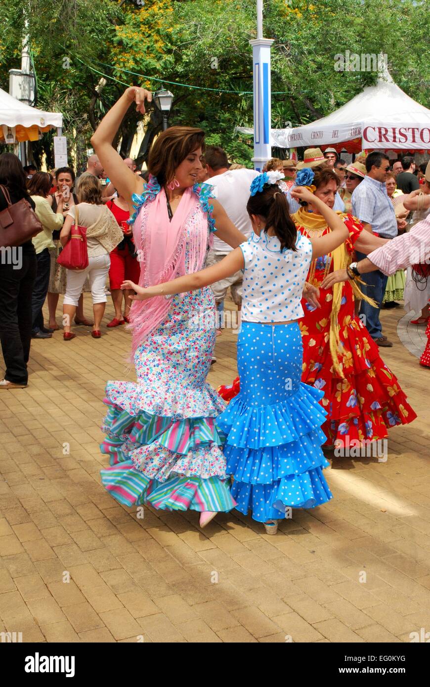 Spanish women flamenco dancing during the Romeria San Bernabe festival, Marbella, Costa del Sol