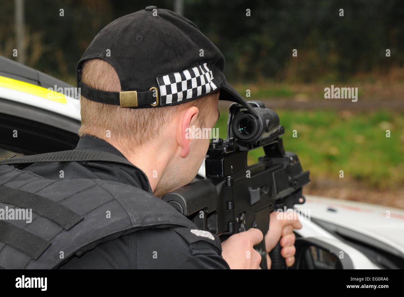 Police firearms officer armed with Heckler and Koch G366 C assault rifle Stock Photo